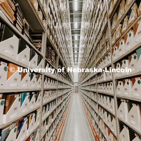 Aisles show some of the 900,000 + books are kept in the Library Depository Retrieval Facility on East Campus. September 29, 2023. Photo by Craig Chandler / University Communication and Marketing
