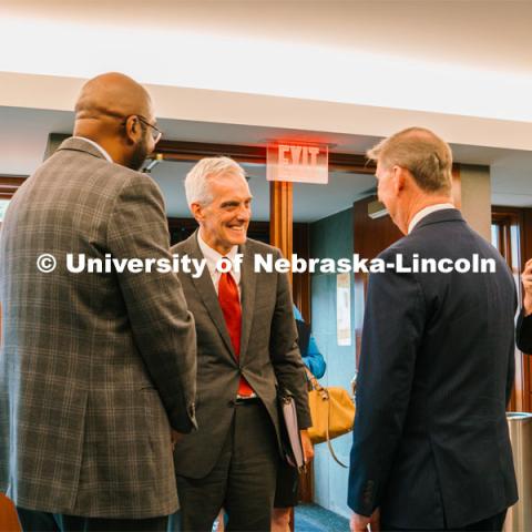 Chancellor Rodney Bennett and President Ted Carter greet U.S. VA Secretary Denis McDonough. McDonough visited Nebraska U to discuss the ongoing implementation of expanded health care services for veterans. October 12, 2023. Photo by Matthew Strasburger / University Communication.