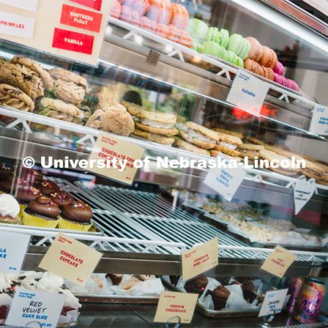 Goldenrod Bakery's many baked goods line the bakery shelves. About Lincoln at Goldenrod Bakery. October 17, 2023. Photo by Matthew Strasburger / University Communication.