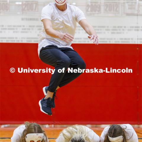 Team 12: Beta Theta Pi, Theta Chi, Delta Delta Delta, Pi Alpha Chi perform wearing white masks. Showtime at the Coliseum. Recognized Student Organizations, Greeks and Residence Halls battle against each other with performances for Homecoming competition points and ultimate bragging rights. Homecoming 2023. October 23, 2023. Photo by Craig Chandler / University Communication.