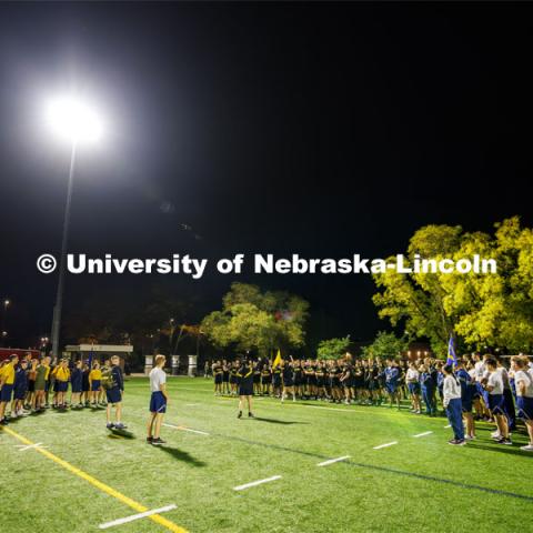 Cadets and midshipmen gather on the Mabel Lee field early Thursday morning for the ROTC Joint Field Meet. The meet is like an ROTC Olympics for the Nebraska cadets and midshipmen. Army, Air Force and Navy/Marine cadets and midshipmen compete in events such as Maneuvering Under Fire, Log Sit-ups, Tug-Of-War, Casualty Evacuation and Ultimate Frisbee. Army beat Navy in a sudden death 4x400 relay to claim the title. October 26, 2023. Photo by Craig Chandler / University Communication.