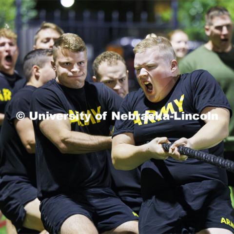 Army cadet Jacob Lang lets out a roar as the Army won their tug. ROTC Joint Field Meet is like an ROTC Olympics for the Nebraska cadets and midshipmen. Army, Air Force and Navy/Marine cadets and midshipmen compete in events such as Maneuvering Under Fire, Log Sit-ups, Tug-Of-War, Casualty Evacuation and Ultimate Frisbee. Army beat Navy in a sudden death 4x400 relay to claim the title. October 26, 2023. Photo by Craig Chandler / University Communication.