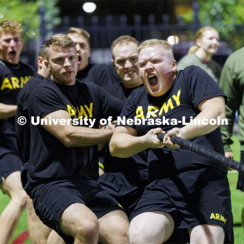 Army cadet Jacob Lang lets out a roar as the Army won their tug. ROTC Joint Field Meet is like an ROTC Olympics for the Nebraska cadets and midshipmen. Army, Air Force and Navy/Marine cadets and midshipmen compete in events such as Maneuvering Under Fire, Log Sit-ups, Tug-Of-War, Casualty Evacuation and Ultimate Frisbee. Army beat Navy in a sudden death 4x400 relay to claim the title. October 26, 2023. Photo by Craig Chandler / University Communication.