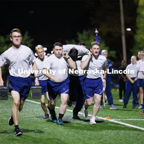 ROTC Joint Field Meet is like an ROTC Olympics for the Nebraska cadets and midshipman. Army, Air Force and Navy/Marine cadets and midshipmen compete in events such as Maneuvering Under Fire, Log Sit-ups, Tug-Of-War, Casualty Evacuation and Ultimate Frisbee. Army beat Navy in a sudden death 4x400 relay to claim the title. October 26, 2023. Photo by Craig Chandler / University Communication.