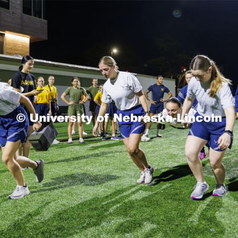 The Air Force female cadets begin the casualty evacuation race. ROTC Joint Field Meet is like an ROTC Olympics for the Nebraska cadets and midshipman. Army, Air Force and Navy/Marine cadets and midshipman compete in events such as Maneuvering Under Fire, Log Sit-ups, Tug-Of-War, Casualty Evacuation and Ultimate Frisbee. Army beat Navy in a sudden death 4x400 relay to claim the title. October 26, 2023. Photo by Craig Chandler / University Communication.