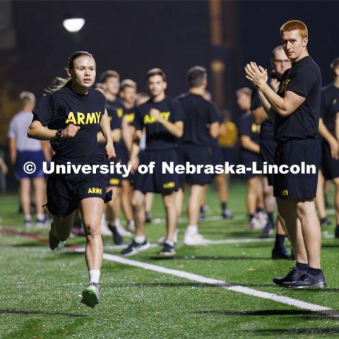 Army cadet Grace Charlesworth finishes her lap in the sudden death 4x400 relay between army cadets and navy midshipmen to claim the title. ROTC Joint Field Meet is like an ROTC Olympics for the Nebraska cadets and midshipman. Army, Air Force and Navy/Marine cadets and midshipmen compete in events such as Maneuvering Under Fire, Log Sit-ups, Tug-Of-War, Casualty Evacuation and Ultimate Frisbee. Army beat Navy in a sudden death 4x400 relay to claim the title. October 26, 2023. Photo by Craig Chandler / University Communication.