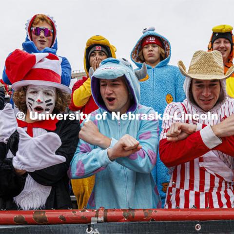 Fans in the Boneyard are dressed in costumes for Halloween and throw the bones. Nebraska football versus Purdue Homecoming game. October 28, 2023. Photo by Craig Chandler / University Communication.