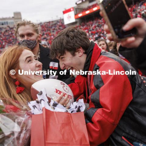 Hannah-Kate Kinney of Omaha celebrates with her twin brother, Jack, after she was crowned homecoming royalty at the University of Nebraska–Lincoln. Seniors Preston Kotik of Hooper and Hannah-Kate Kinney of Omaha were crowned homecoming royalty at halftime of the University of Nebraska–Lincoln versus Purdue game. Nebraska football versus Purdue Homecoming game. October 28, 2023. Photo by Craig Chandler / University Communication.