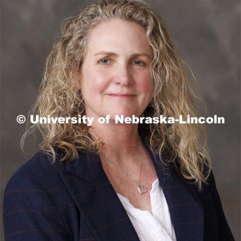 Studio portrait of Pamela Shanahan Bazis, Assistant Professor, Department of Special Education and Communication Disorders. CEHS. November 7, 2023. Photo by Craig Chandler / University Communication and Marketing