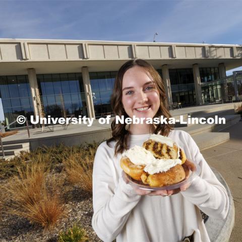 Alexa Carter, a freshman in agricultural leadership, education and communication and an Engler Agribusiness Entrepreneur. holds her “Chili Rolls,” a treat that joins the sweet and savory majesty of the Midwest’s legendary chili and cinnamon rolls. November 29, 2023. Photo by Craig Chandler / University Communication and Marketing.