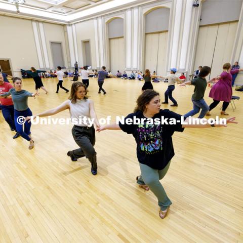 Students perform a waltz in the ballroom. Ballroom Dancing Club works through their final practice in the Nebraska Union Ballroom Thursday night before Saturday’s show. December 7, 2023. Photo by Craig Chandler / University Communication and Marketing.