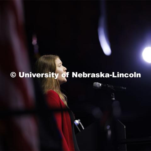 Sarah Wibben performs the national anthem. Graduate Commencement at Pinnacle Bank Arena. December 15, 2023. Photo by Craig Chandler / University Communication and Marketing.