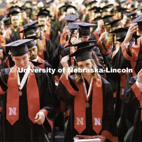 Undergraduate commencement move their tassels at the conclusion of commencement in Pinnacle Bank Arena. December 16, 2023. Photo by Craig Chandler / University Communication and Marketing.