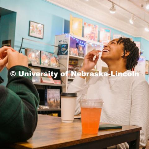 Mana Games is a gaming cafe in the Haymarket's historic Creamery building where you can grab a quick bite and a cup of coffee while you connect with other gamers. For About Lincoln website. December 12, 2023. Photo by Matthew Strasburger / University Communication.