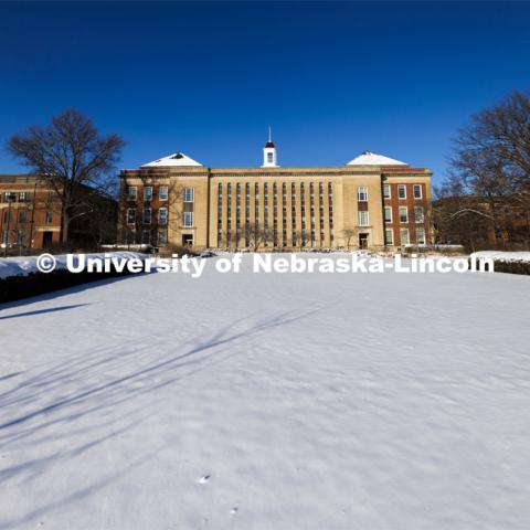 Exterior view of the south side of Love Library on a snow day. Snow on city campus. January 9, 2024. Photo by Craig Chandler / University Communication and Marketing.