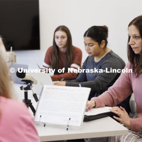 Jessie Kohn (right), Lecturer in Special Education and Communication Disorders, watches and records the voices levels as Rhonda Heiserman of Lincoln, during her clinic session. Graduate students Claire Streeter, left, and Nayeli Cruz takes notes. Parkinson Voice Project. February 6, 2024. Photo by Craig Chandler / University Communication and Marketing.