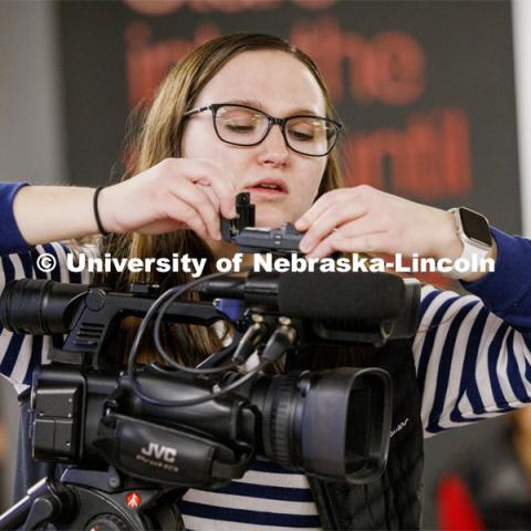 Alex Fernando leads a workshop for students from Lefler Middle School. Fernando and College of Journalism and Mass Communications ambassadors had the students taking photos, doing video shooting, social media posts and an advertising campaign. February 7, 2024. Photo by Craig Chandler / University Communication and Marketing.