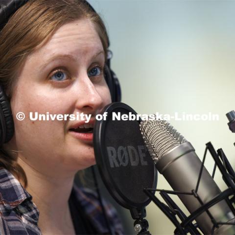 Rachael Wagner, a biomedical engineering doctoral student at Nebraska, talks with NASA mission control in Huntsville, Alabama, as she readies the surgical robot test with the International Space Station. Nebraska Engineering professor and Virtual Incision founder Shane Farritor successfully performed robotic surgery on the International Space Station. Controlled from the Virtual Incision offices in Lincoln, NE, surgeons cut rubber bands–mimicking surgery–inside a payload box on the International Space Station. February 10, 2024. Photo by Craig Chandler / University Communication and Marketing.