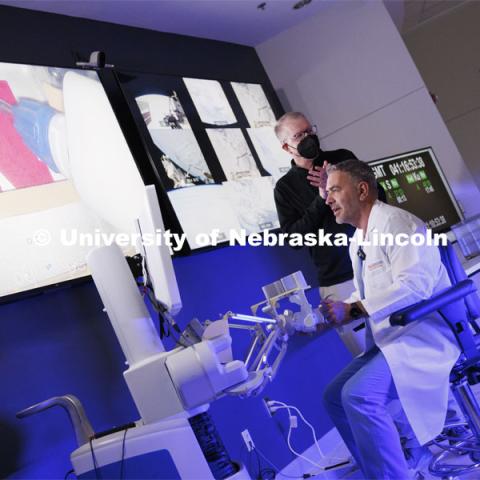 Dr. Theodoros “Ted” Voloyiannis of Texas Colon and Rectal Specialties in Houston, TX, concentrates while using the Space MIRA. Nebraska Engineering professor and Virtual Incision founder Shane Farritor successfully performed robotic surgery on the International Space Station. Controlled from the Virtual Incision offices in Lincoln, NE, surgeons cut rubber bands–mimicking surgery–inside a payload box on the International Space Station. February 10, 2024. Photo by Craig Chandler / University Communication and Marketing.