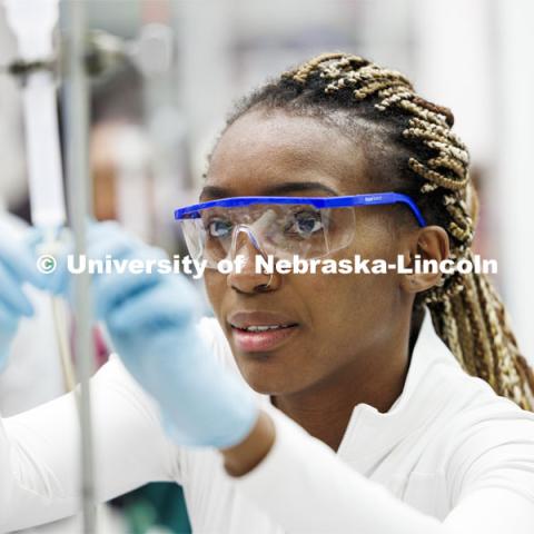 Favour Wanjoku works to get her solution to drip through the test setup to awaiting test tubes. Students isolate and purify lysozyme from actual egg whites in BIOC 401L - Laboratory for Elements of Biochemistry. February 13, 2024. Photo by Craig Chandler / University Communication and Marketing.