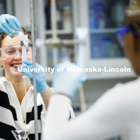 Anna Zingler adds solution to drip through the test setup to awaiting test tubes. Students isolate and purify lysozyme from actual egg whites in BIOC 401L - Laboratory for Elements of Biochemistry. February 13, 2024. Photo by Craig Chandler / University Communication and Marketing.