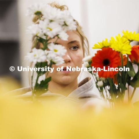 Emily Boyle, a senior Speech-Language Pathologist student designs her bouquet in PLAS 261 - Floral Design I in the Plant Science Building. February 21, 2024. Photo by Craig Chandler / University Communication and Marketing