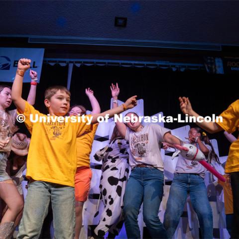 Miracle kids and University of Nebraska-Lincoln students dance on stage at Dance Marathon. University of Nebraska–Lincoln students raised $83,702.24 during the annual HuskerThon. Also known as Dance Marathon, the event is part of a nationwide fundraiser supporting Children’s Miracle Network Hospitals. The annual event, which launched in 2006, is the largest student philanthropic event on campus. The mission of the event encourages participants to, “dance for those who can’t.” All funds collected by the Huskers benefit the Children’s Hospital and Medical Center in Omaha. March 2, 2024. Photo by Kirk Rangel.