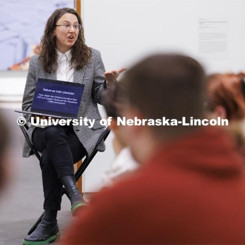 Katie Anania talks with students as they study in the in the Unprecedented: Art in Times of Crisis exhibit space. Anania’s AHIS 381: Visualizing Crisis. Professors using the Sheldon Museum of Art as part of their classroom teaching. Photos for Nebraska Quarterly alumni magazine. March 7, 2024. Photo by Craig Chandler / University Communication and Marketing.