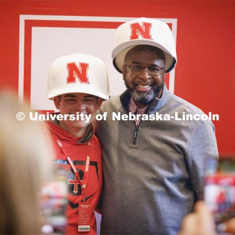 Presidential Scholar Rocco Zimmerman and UNL Chancellor Rodney Bennett pose for a photo at the Presidential Scholar breakfast Saturday morning wearing oversized Nebraska baseball caps. Zimmerman scored a perfect 36 on the ACT. Admitted Student Day is UNL’s in-person, on-campus event for all admitted students. March 23, 2024. Photo by Craig Chandler / University Communication and Marketing.