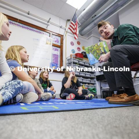 Jack Hilgert, Conservation Education Coordinator for the Nebraska Forest Service, teaches second graders about trees at Humboldt-Table Rock-Steinauer school in Humboldt, Nebraska. Each student was given a Colorado blue spruce seedling to raise in the classroom while they learn about trees. March 25, 2024. Photo by Craig Chandler / University Communication and Marketing.