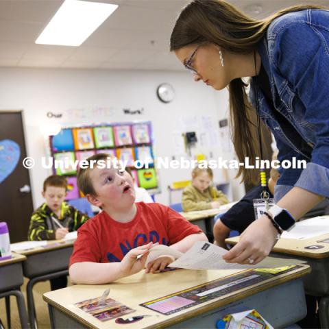 Hannah Cooper student teaches first graders in Thayer Central Elementary School in Hebron, Nebraska. April 11, 2024. Photo by Craig Chandler / University Communication and Marketing.