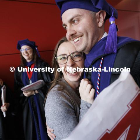 Grant Jones and his wife, Mikayla, following the ceremony. Mikayla will be a third-year Nebraska Law student in the fall. College of Law commencement in Devaney on the volleyball court. May 3, 2024. Photo by Craig Chandler / University Communication and Marketing.