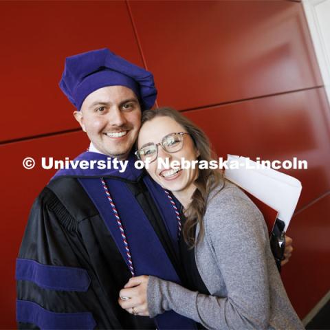 Grant Jones and his wife, Mikayla, following the ceremony. Mikayla will be a third-year Nebraska Law student in the fall. College of Law commencement in Devaney on the volleyball court. May 3, 2024. Photo by Craig Chandler / University Communication and Marketing.