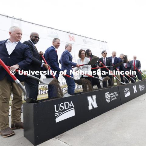 Dirt flies at the ceremonial groundbreaking following the program. The U.S. Department of Agriculture's (USDA's) Agricultural Research Service (ARS), the University of Nebraska–Lincoln (UNL), and Nebraska Innovation Campus held a groundbreaking ceremony today to launch the construction of the National Center for Resilient and Regenerative Precision Agriculture. May 6, 2024. Photo by Craig Chandler / University Communication and Marketing.