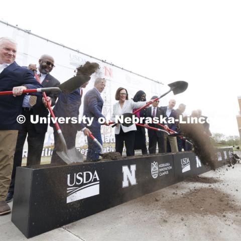 Dirt flies at the ceremonial groundbreaking following the program. The U.S. Department of Agriculture's (USDA's) Agricultural Research Service (ARS), the University of Nebraska–Lincoln (UNL), and Nebraska Innovation Campus held a groundbreaking ceremony today to launch the construction of the National Center for Resilient and Regenerative Precision Agriculture. May 6, 2024. Photo by Craig Chandler / University Communication and Marketing.