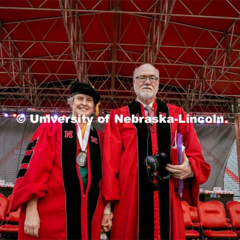 Bob and Vanessa Gorman are the University of Nebraska–Lincoln’s power couple who play important roles at the 2024 undergraduate commencement. Faculty in classics and religious studies (as well as a professor of history role for Vanessa), the Gormans find purpose and satisfaction in helping direct the graduation experience, particularly seeing joy in students’ eyes. Spring 2024 Undergraduate Commencement. May 18, 2024. Photo by Kristen Labadie / University Communication.