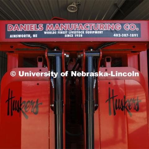 A hydraulic squeeze chute is ready for the beef. The handling equipment at the new center was donated by Daniels Manufacturing Company of Ainsworth, Nebraska. Feedlot Innovation Center at the Eastern Nebraska Research, Extension and Education Center (ENREEC) near Mead, Nebraska. June 21, 2024. Photo by Craig Chandler / University Communication and Marketing.