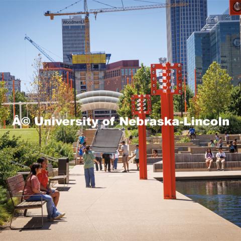 A film crew records downtown Omaha. Behind the scenes photo for the university's new "Home Again" national advertisement. June 26, 2024. Photo by Kristen Labadie / University Communication.   