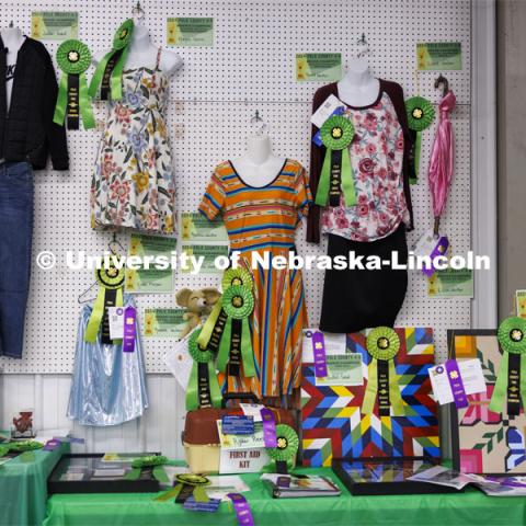 Ribbons adorn the clothing exhibit entries. 4-H Polk County Fair in Osceola, Nebraska. July 19, 2024. Photo by Craig Chandler / University Communication and Marketing.