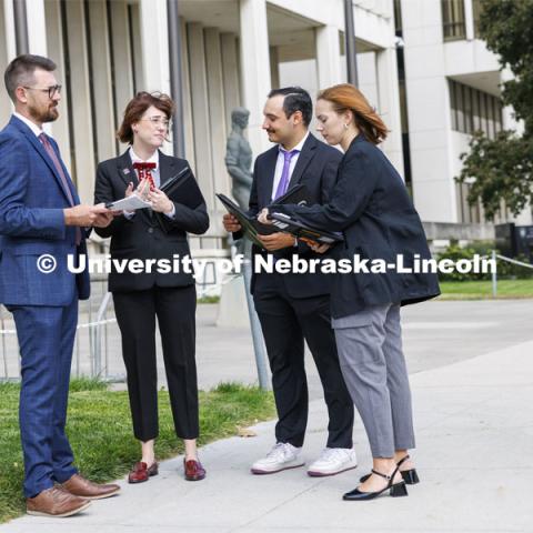 Lecturer Rachel Tomlinson Dick (center) talks with students in the Housing Justice Clinic outside of the courthouse in downtown Lincoln. College of Law Clinics. September 19, 2024. Photo by Craig Chandler / University Communication and Marketing.