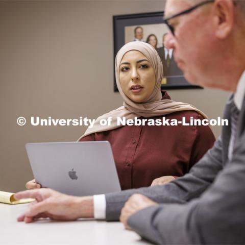 Professor Kevin Ruser meets with law students in the Immigration Clinic. College of Law Clinics. September 19, 2024. Photo by Craig Chandler / University Communication and Marketing.