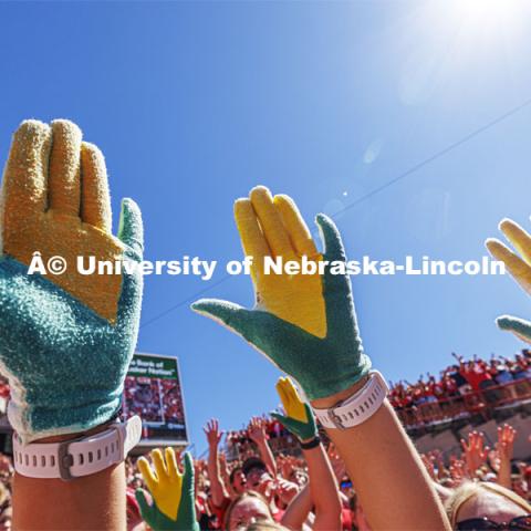 A group in the student section show off their "corn hands". Nebraska football game vs UTEP. August 31, 2024. Photo by Craig Chandler / University Communication and Marketing.