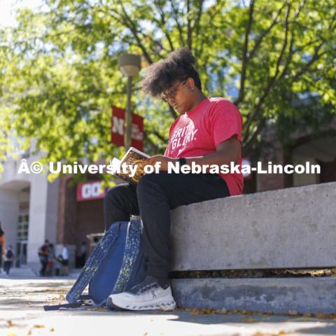 Nathan Bullard, a second-year student from Gretna, studies on the Nebraska Union plaza. Students on city campus. September 3, 2024. Photo by Craig Chandler / University Communication and Marketing.