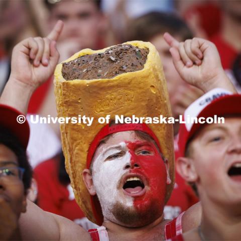 One fan shows his Nebraska spirit by sporting a Runza sandwich shaped hat at the Nebraska vs. Illinois football game. September 20, 2024. Photo by Craig Chandler / University Communication and Marketing.