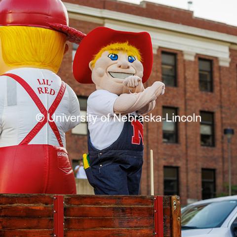 Herbie and Lil’ Red ride in a float at the 2024 Homecoming parade. 2024 Homecoming celebration. October 4, 2024. Photo by Kristen Labadie / University Communication.