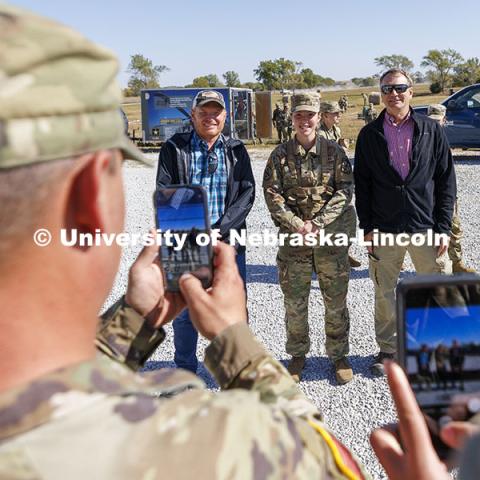 Cadet Jenny Goesch poses with biological system engineering professors Aaron Mittelstet (left) and Alan Boldt. Goesch nominated Mittelstet and Boldt for their support. ROTC cadets on fall exercise. October 4, 2024. Photo by Craig Chandler / University Communication and Marketing.