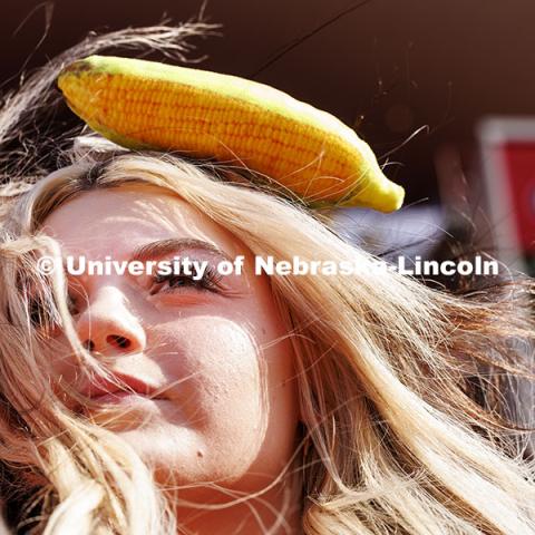 Madison Boyden wore a fabric ear of corn clipped in her hair. Nebraska vs Rutgers football game. Homecoming game. October 5, 2024. Photo by Craig Chandler / University Communication and Marketing.