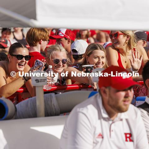 Fans snap pictures on their phones at the Nebraska vs Rutgers football game. Homecoming game. October 5, 2024. Photo by Craig Chandler / University Communication and Marketing.