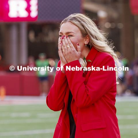 Homecoming royalty Emmerson Putnam, biological sciences major of Bellevue, Nebraska reacts after being named homecoming royalty. Nebraska vs Rutgers football game. Homecoming game. October 5, 2024. Photo by Craig Chandler / University Communication and Marketing.