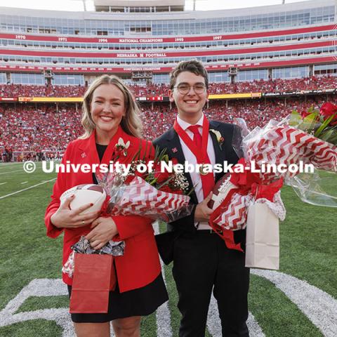 Homecoming royalty Emmerson Putnam, biological sciences major of Bellevue, Nebraska and Jaime Smith, a music education major of West Des Moines, Iowa, pose after being named in the halftime ceremony. Nebraska vs Rutgers football game. Homecoming game. October 5, 2024. Photo by Craig Chandler / University Communication and Marketing.